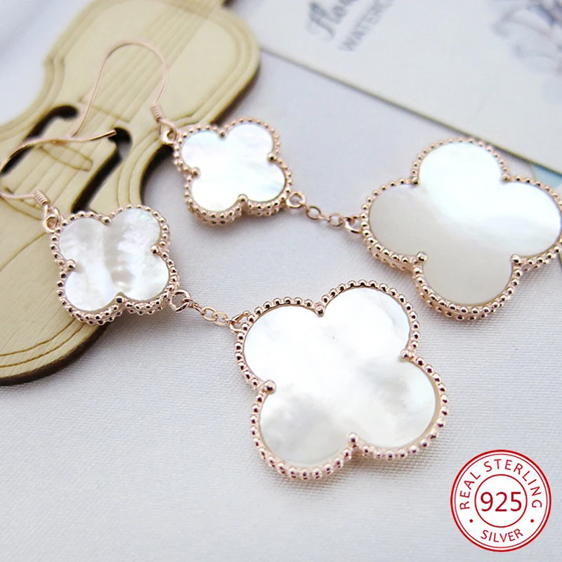 

S925 sterling silver earrings four-leaf clover female peacock green white fritillary Korean version simple Christmas gifts 2019