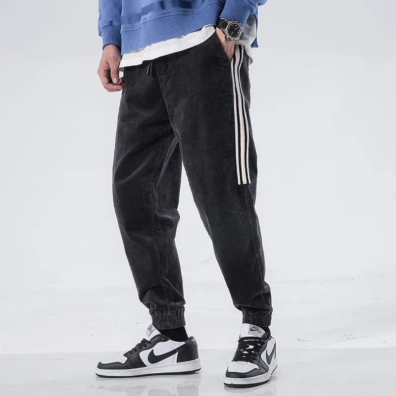 

Japanese Style Fashion Men Jeans Loose Fit White Stripe Designer Corduroy Harem Pants homme Streetwear Hip Hop Joggers Pants Men