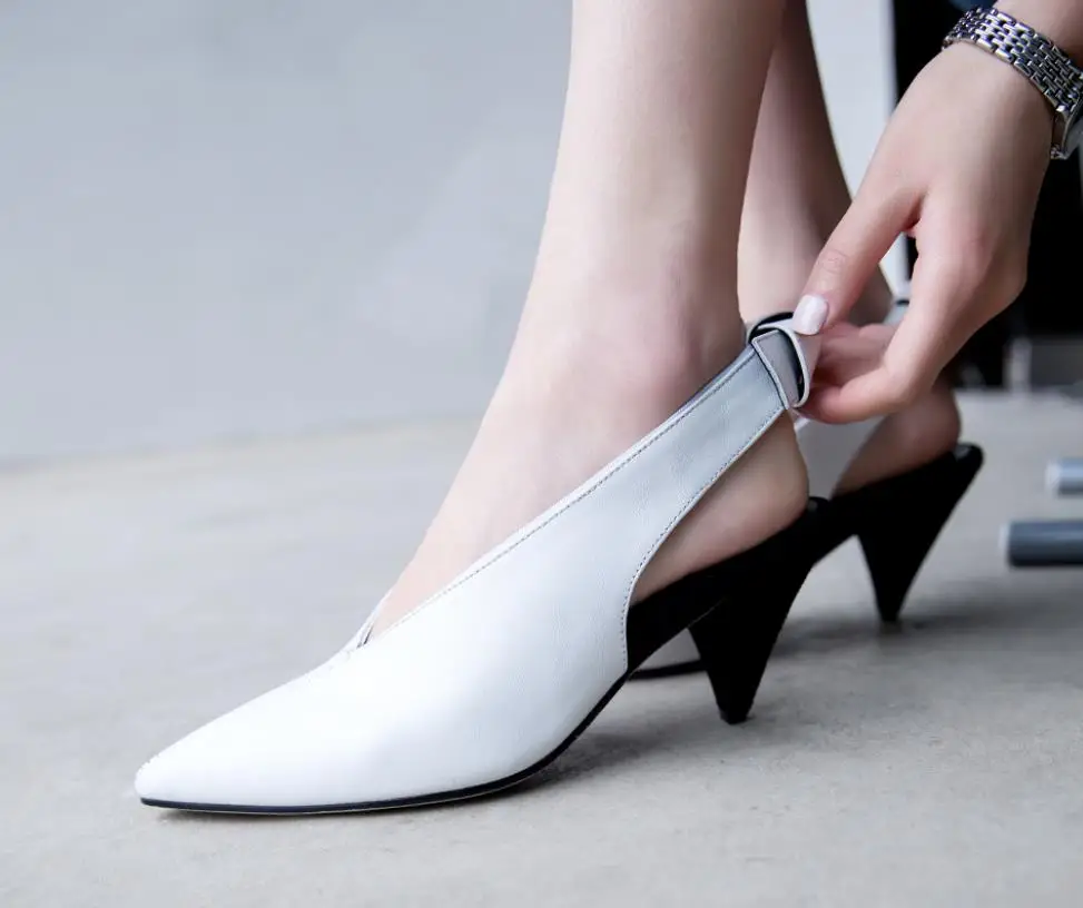 

Spring and summer new fashion cone-tipped bag head leather high heels