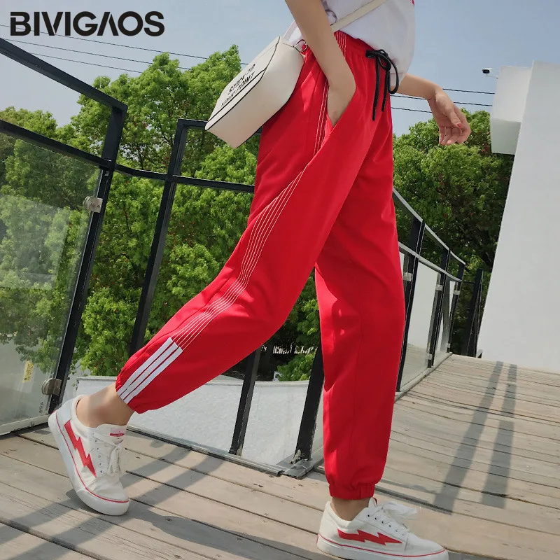 BIVIGAOS осенние Модное движение новые корейские модные женские белые полосатые шаровары повседневные свободные штаны в уличном стиле тренировочные брюки с завязками для женщин