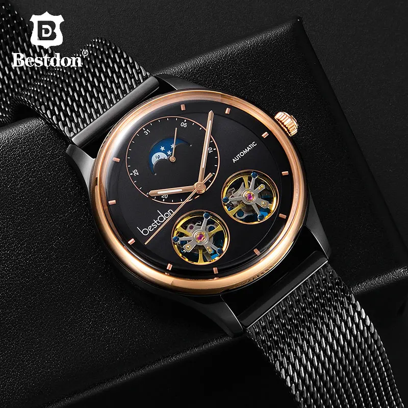 Bestdon الهيكل العظمي ساعات آلية للرجال التلقائي الأزياء مضيئة القمر المرحلة للماء ووتش سويسرا الفاخرة الذكور العلامة التجارية Bestdon الهيكل العظمي ساعات آلية للرجال التلقائي الأزياء مضيئة القمر المرحلة للماء ووتش سويسرا الفاخرة الذكور العلامة التجارية