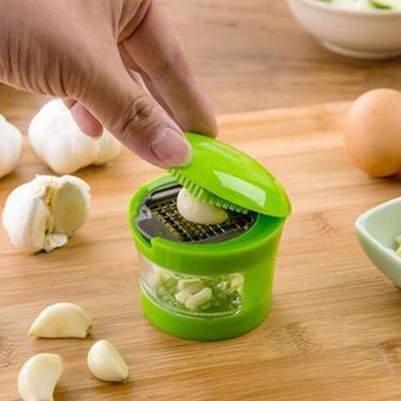 

Garlic Press Chopper Garlic Crusher Grinder Slicer Cutter Garlic Chopper Vegetable Tools Kitchen Gadgets 8A0001