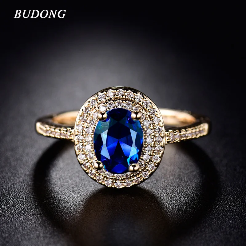 

BUDONG Fashion Halo Finger Ring Charming Gold-Color Ring Big Shiny Oval Crystal Zircon Luxury Wedding Jewelry For Women XUR289