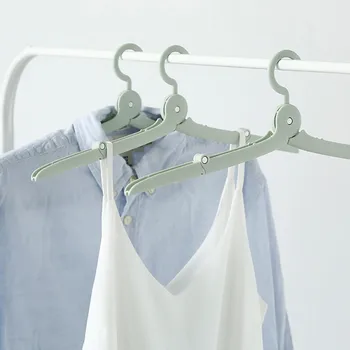 

10pcs/set Portable Travel Folding Hangers Magic Stretch Clothes Plastic Hangers Wet and Dry Outdoor Wardrobe Storage Racks