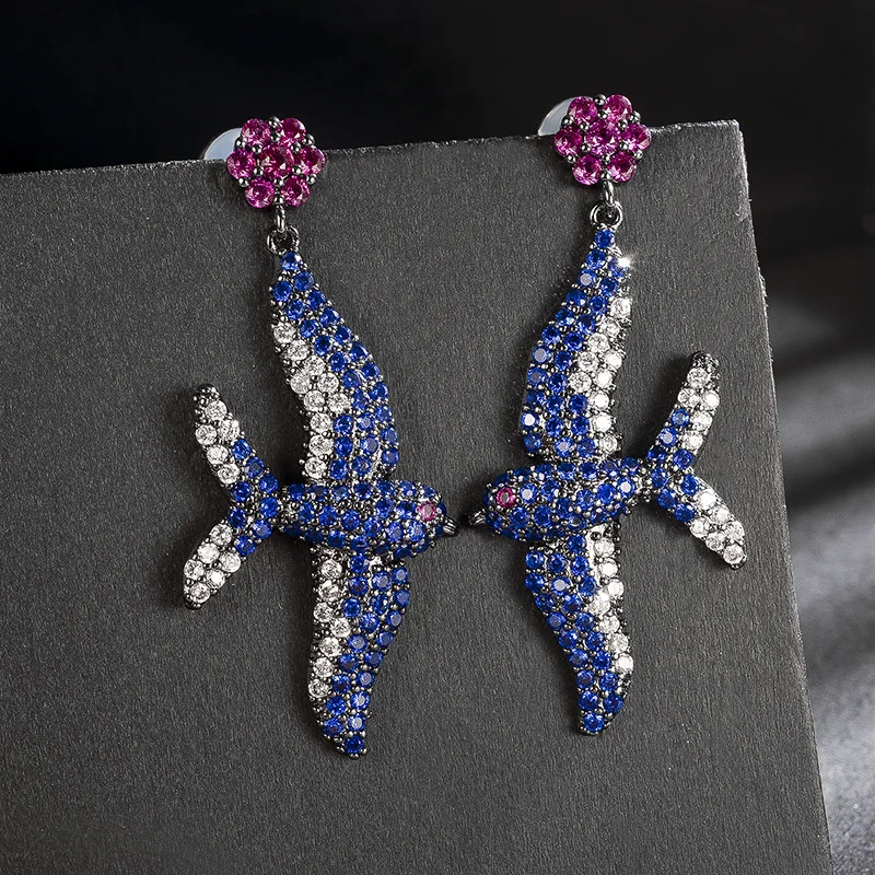 

Europe and the United States new fashion micro-inlaid zircon seabird earrings personalized boutique trend bird earrings