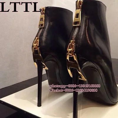 black ankle boots with gold zipper