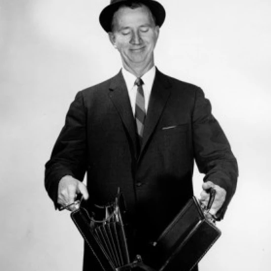 Close-up of a businessman opening a briefcase Poster Print (18 x 24)