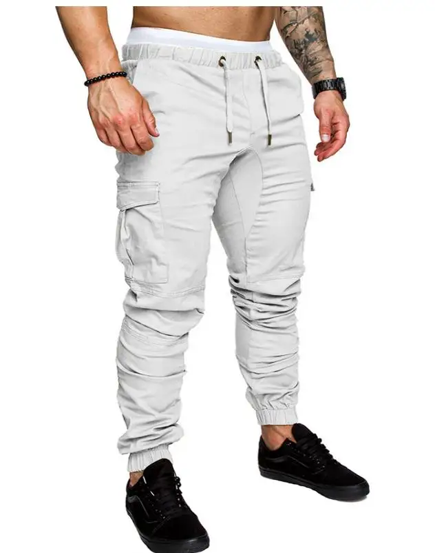 Мужской мужские брюки для бега одноцветное с несколькими карманами десять цветов Штаны впитывает пот и Штаны бренд Для мужчин Штаны в стиле хип-хоп шаровары, штаны для бега Штаны M-4XL - Цвет: Белый