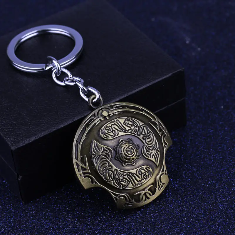 

Fashion Anime Dota Key Chains Dota 2 Immortal Scudetto Shield Keyrings 10pcs/lot