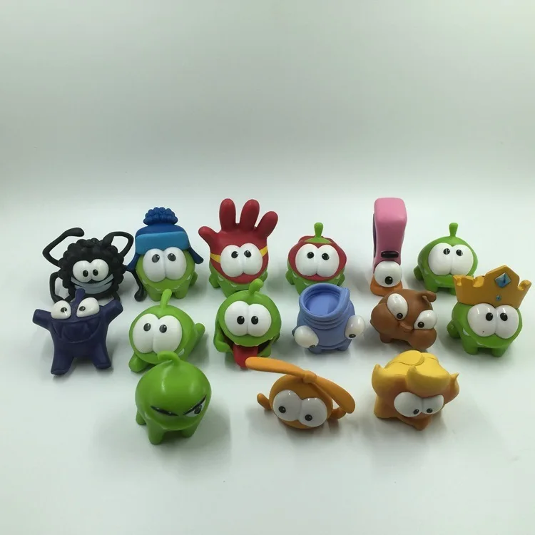 Aléatoire 10pc différent corde grenouille jeu poupée couper la corde OM NOM bonbons moulant monstre jouets Action Figure jouet pour enfant cadeau d'anniversaire