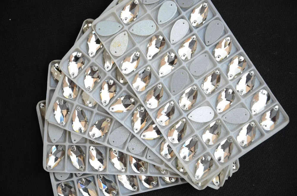

Flatback Teardrop Sew On Stones Crystal Clear Color 2holes 7*12,11*18,13*22,16*25,17*28,22*38,10*14mm Drop Sewing Glass Crystal