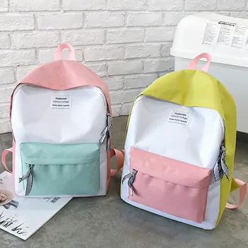 

Fashion ladies backpack leisure college bag Korean version of the couple bag travel hiking bag hit color backpack Dropship T708