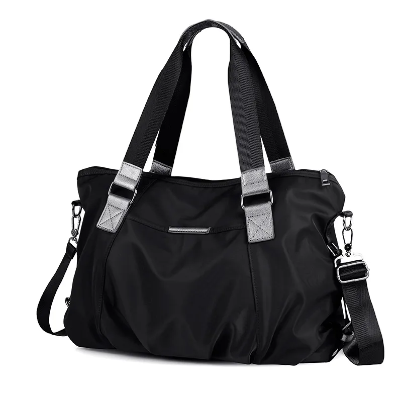 

brand high quality waterproof handbag Large nylon men and women's leisure bag Contracted joker travel bag 2016 winter famale bag