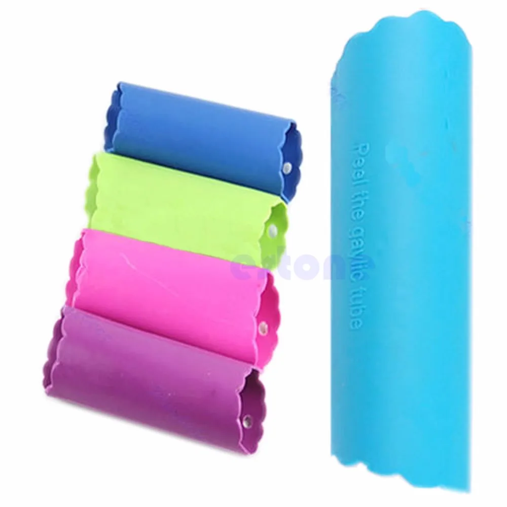

Hot Sale New 10pcs/lot Magic Silicone Garlic Peeler Peel Easy Useful Kitchen Tool New Free Shipping