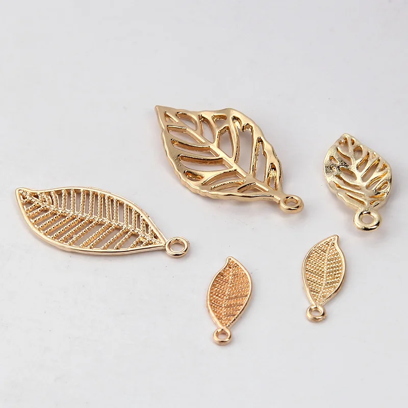 

50PCS Gold Color Plated Alloy Hollow Tree leaf Charms Leaves Pendant for Diy Jewelry Findings Jewelry Accessories wholesale