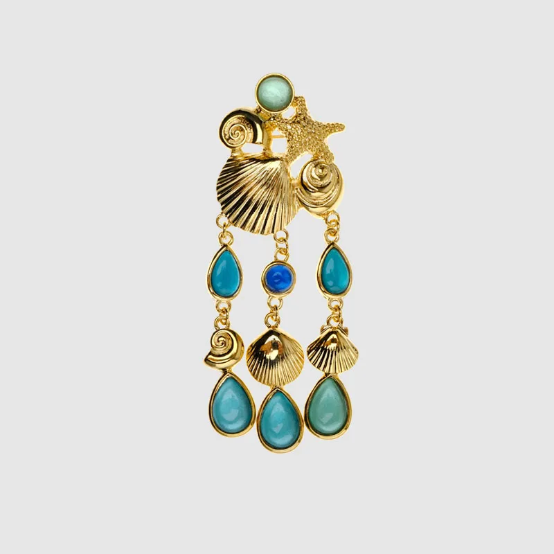 

Amorita boutique Golden shell and blue sand brooch