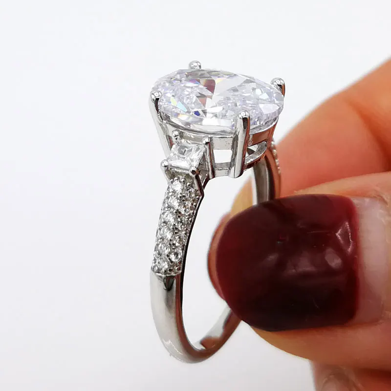 COLORFISH Luxury 4ct Three Stone Engagement Rings For Women 925 Sterling Silver Oval Cut Sona Synthetic Pave CZ Wedding Bands