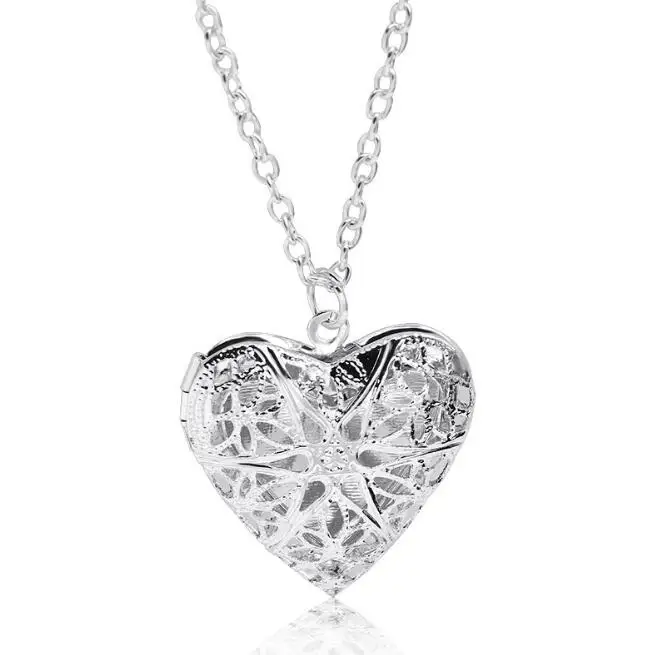 

High Qualitry 2017 Fashion Heart-shaped love necklace can be opened and put a small photo Hollow peach heart shaped box necklace