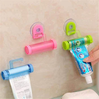 

Plastic Rolling Tube Squeezer Toothpaste Dispenser Sucker Holder Dental Cream Bathroom Manual Syringe Gun Dispenser