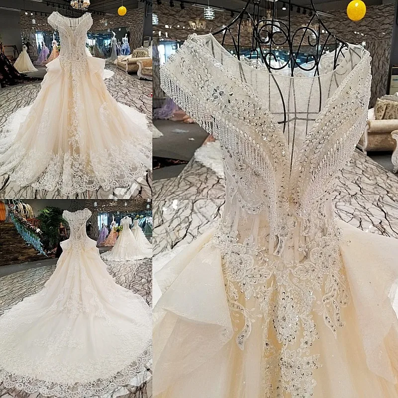 

Wedding Dress The High-end V-neck Luxury Lace Embroidery Elegant Sweep Train Ball Gown Sexy Illusion Bling Bling Bridal Gown
