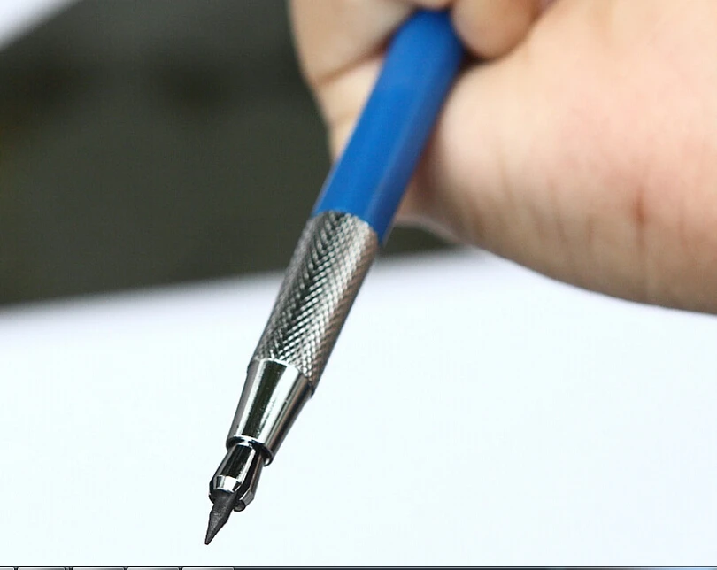 застрял грифель в механическом карандаше. кончик карандаша. сломался грифель карандаша. карандаш цанговый koh-i-noor 2 мм. сломанный грифель карандаша.