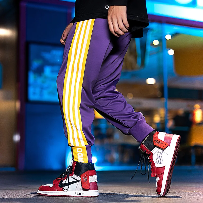 

Punk Style Fashion 2019 Long Pants Casual joggers Pants Men Wear Elastic Sweatpants Fitness Hip Hop High Street Striped Trousers