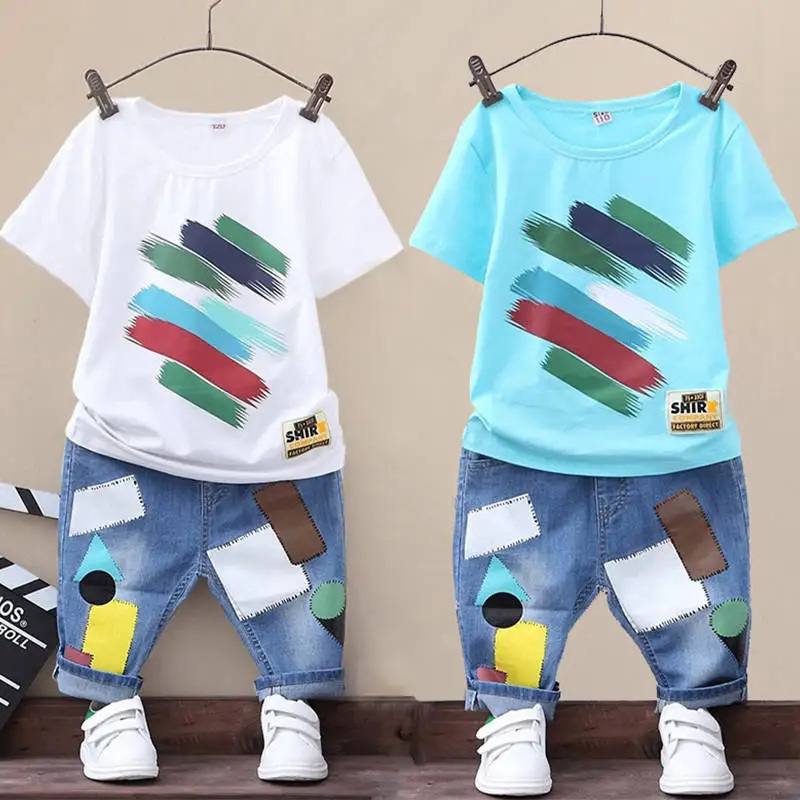 

Boys summer dress 2019 new suit big boy Korean version of the short-sleeved T-shirt denim pants children's wear sports two-piece