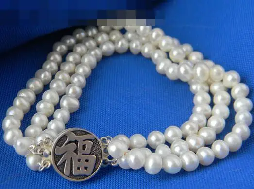 

3769 3StrandsWhite Round Freshwater Pearl Silver Bracelet