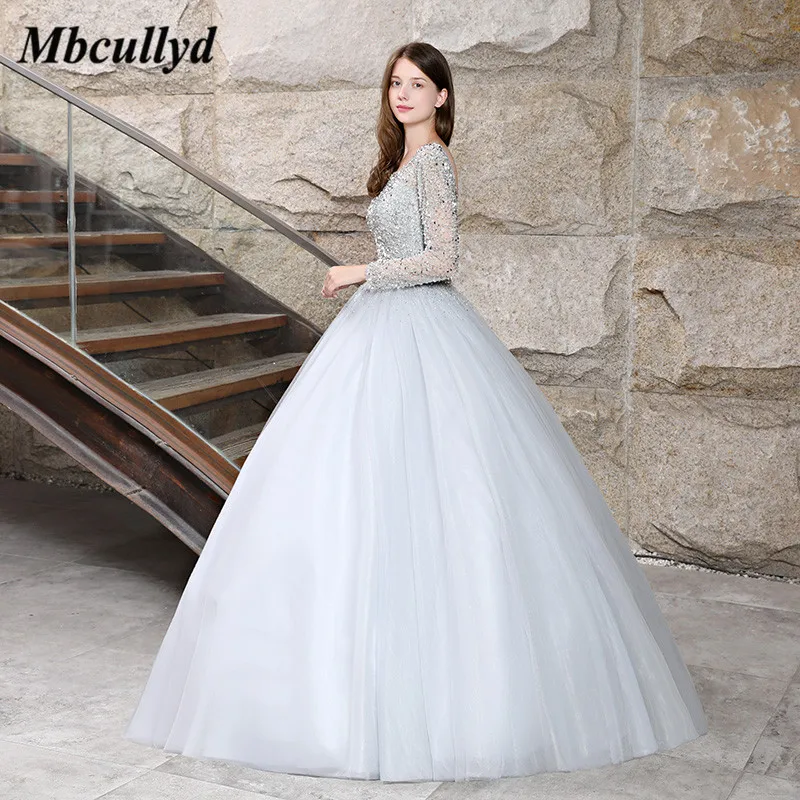 Mbcullyd 2019 платья для Quinceanera прозрачное бальное платье с длинным рукавом и бусинами