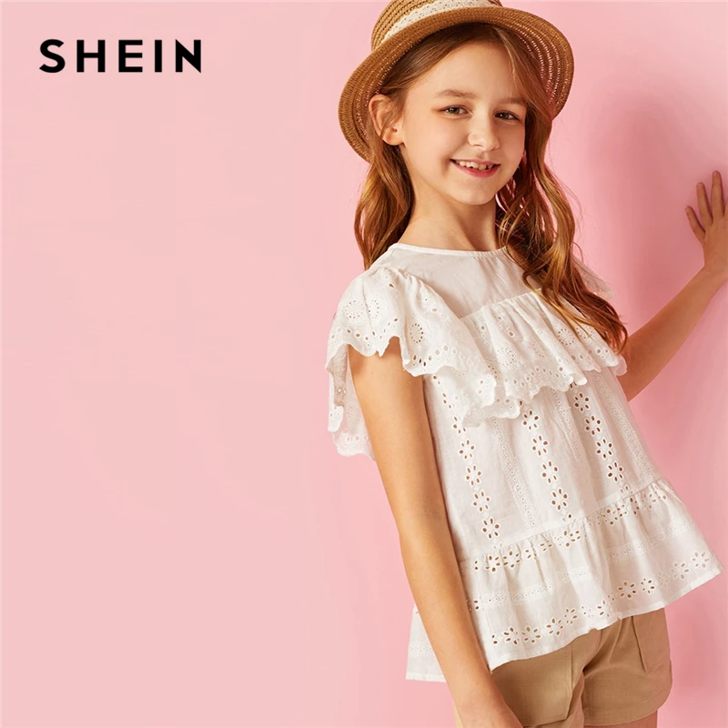 SHEIN Kiddie White Solid Keyhole Back Button Ruffle Hem Peplum Blouse Children 2019 Summer Vacation Sleeveless Boho Beach Tops SHEIN Kiddie White Solid Keyhole Back Button Ruffle Hem Peplum Blouse Children 2019 Summer Vacation Sleeveless Boho Beach Tops
