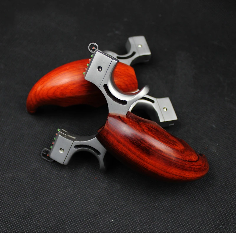 مقلاع الصيد الفولاذ المقاوم للصدأ رئيس المنجنيق الخشب مقبض اطلاق النار حبال النار في الهواء الطلق لعبة مع شقة شريط مطاطي 2019 جديد مقلاع الصيد الفولاذ المقاوم للصدأ رئيس المنجنيق الخشب مقبض اطلاق النار حبال النار في الهواء الطلق لعبة مع شقة شريط مطاطي 2019 جديد