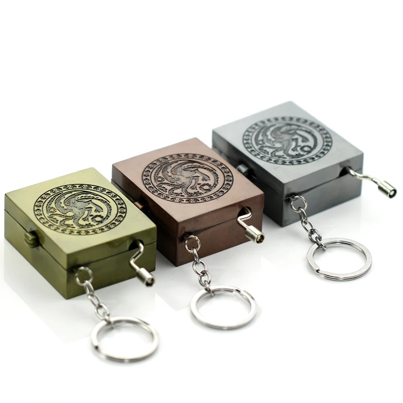 

Game of Thrones Music Box Key Chain Hand Crank Game of Thrones Music Box For Christmas Day Gifts Stark Wolf Pins Family Crest