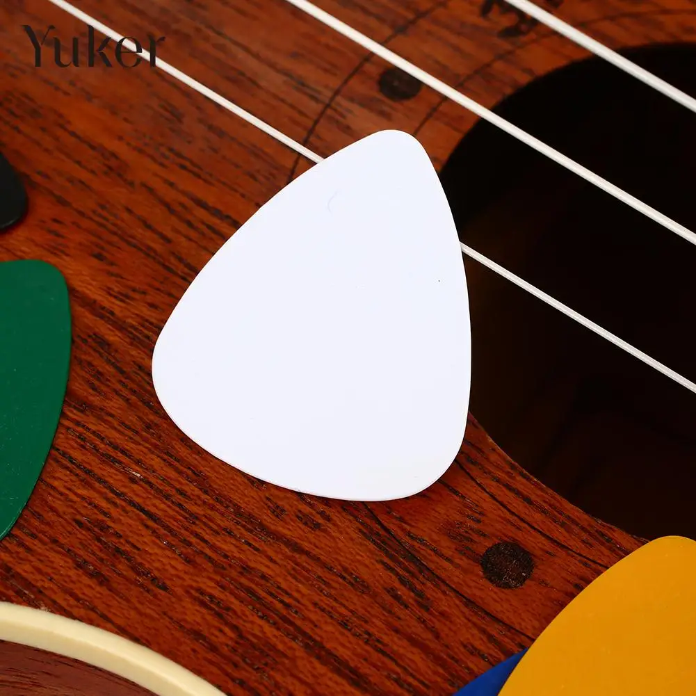 25pcs colorful 0.51/0.71/0.46mm thickness Guitar Picks Plectrums Celluloid Mediators Bass Guitar parts -