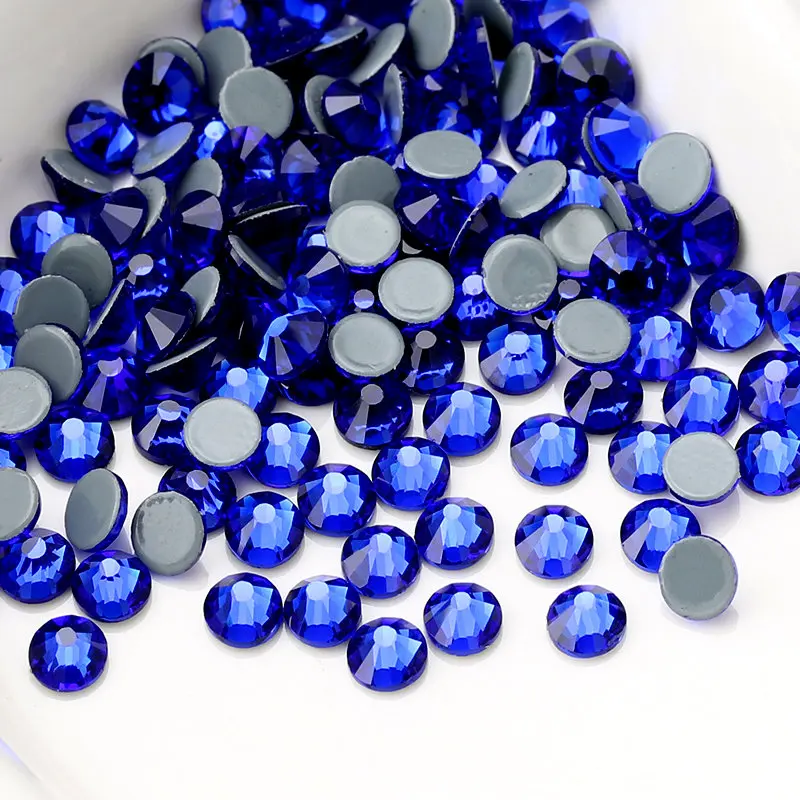 

Top Quality DMC Sapphire Hot-Fix Rhinestones SS16 SS20 SS30 Crystal Glass Iron on Rhinestone for Clothes Wedding Decoration