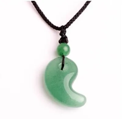 

Pure natural crystal pendant Dongling lovers magatama pendant Tai chi Yin and Yang fish buckle Crescent spike pendant
