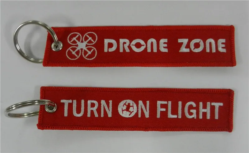 

Drone Zone Turn On Flight Factory Price Fabric Keychains Made By Twill + Ring With Merrow Border Accept Custom