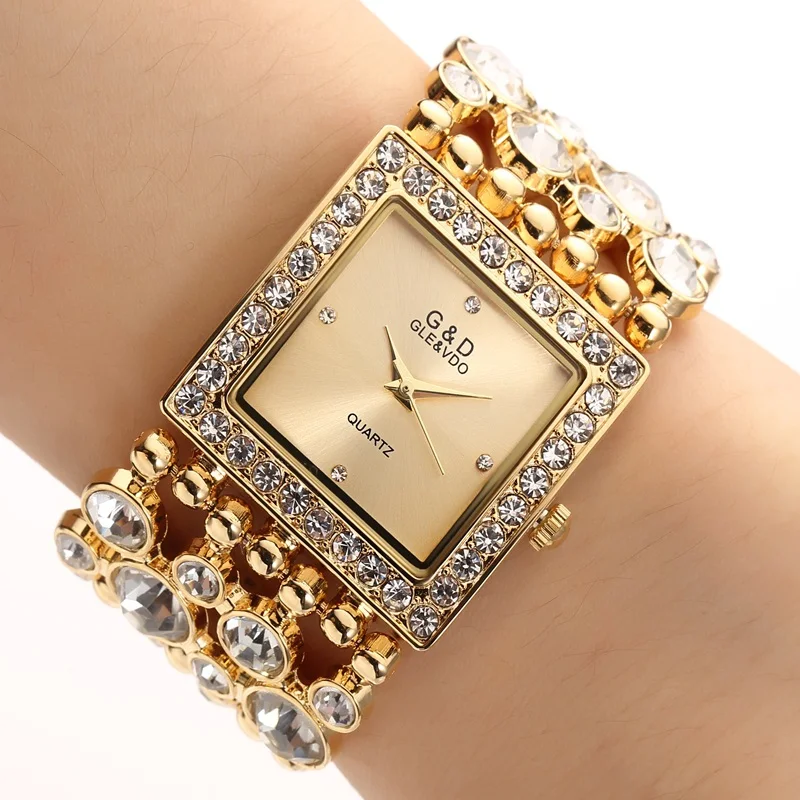 Для женщин Нержавеющая сталь часы леди Сияющий платье смотреть большой алмазный камень Наручные часы Часы часов