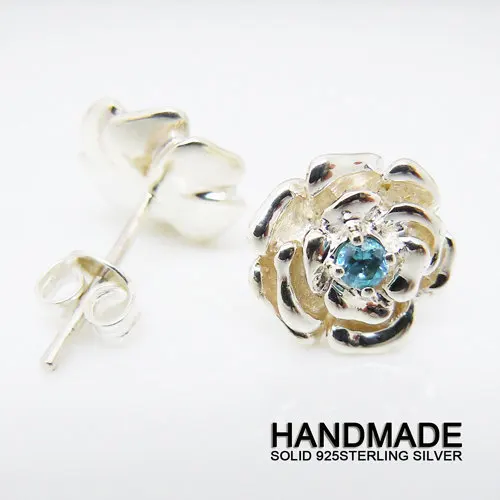 

Solid Sterling Silver&Lt Blue CZ Rose Earrings