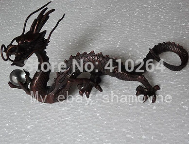 

Exquisite Chinese totem dragon bronze statue grasping a glass crystal ball