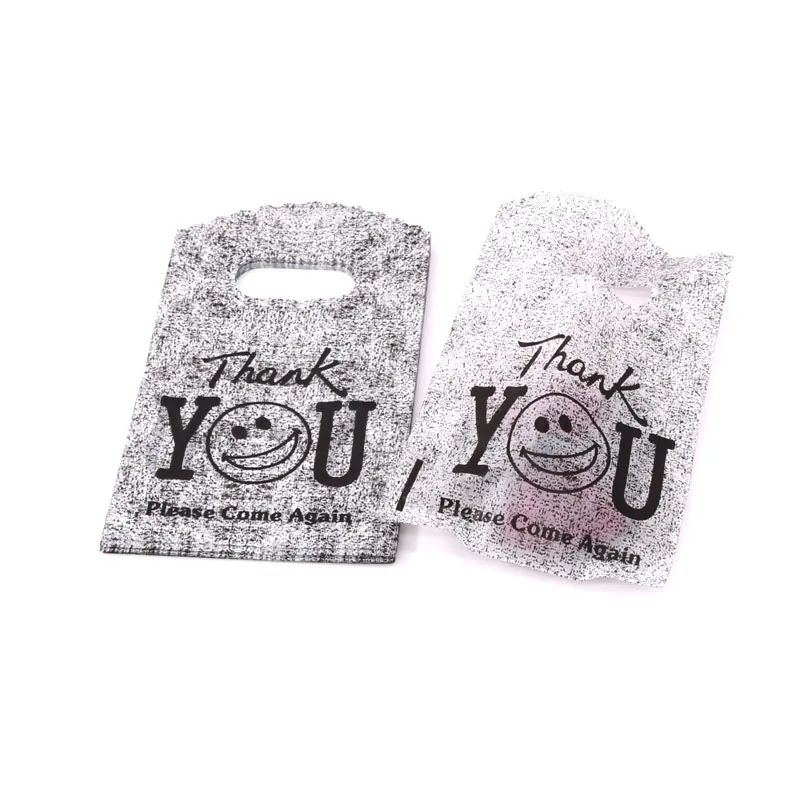 

500pcs/lot Multi Designs Small Plastic Bag 9x15cm Boutique Gift Bag With Handles Nice Charms Earrings Jewelry Packaging Bags