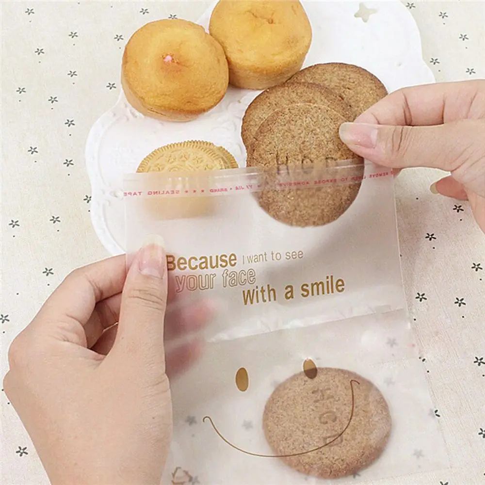 

50Pcs Cute Big Smile Plastic Bag Wedding Birthday Cookie Candy Party Gift Packaging Bags OPP Self Adhesive Party Favors