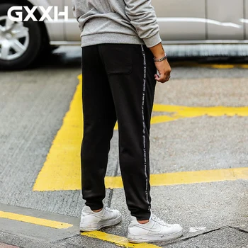 

Spring and Autumn new men "s Large size trousers men Loose casual pants tether stretch Printed letters Feet pants Size 2XL-6XL