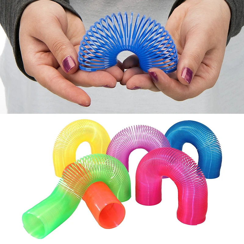 

Green Colored Plastic Spring Ring Magic Stacking Ring Children's Puzzle Toys