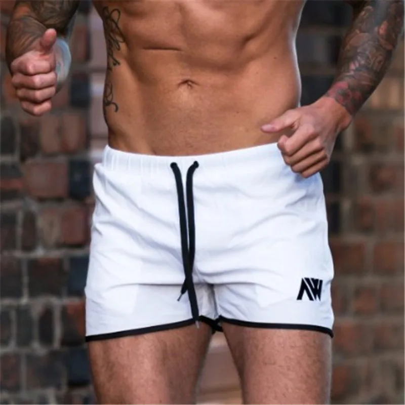 Летние Новые мужские повседневные дышащие быстросохнущие шорты для бодибилдинга, бегунов, фитнеса, обтягивающие мужские спортивные штаны - Цвет: White