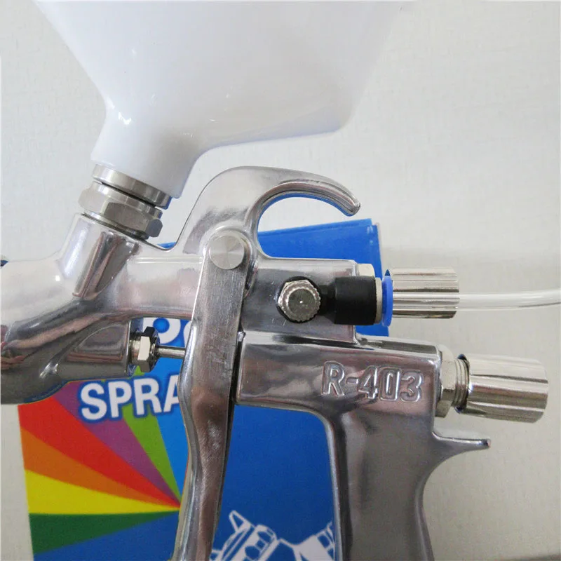 Pressure spray gun