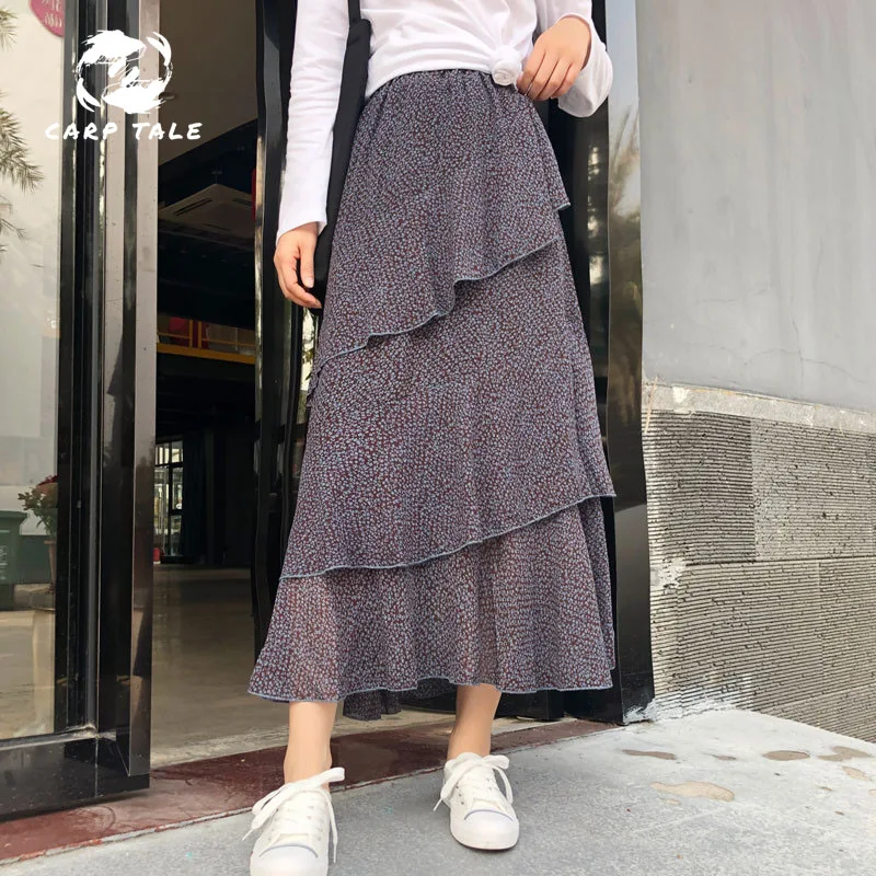 

2019 spring and summer fairy skirt Korean casual walking high waist irregular wave point skirt female chiffon floral cake skirt