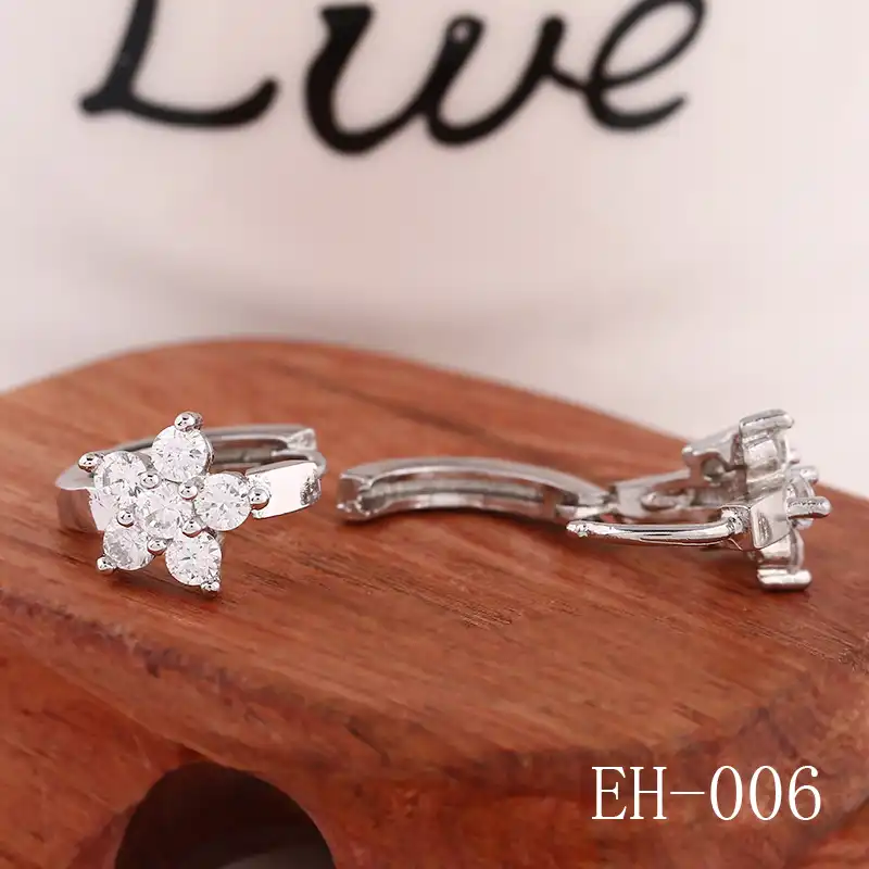 2017 Бесплатная доставка ювелирные изделия Han edition женские розы Циркон серьги и клипсы для ушей Джокер цветок оптовая продажа серьги производитель eh006