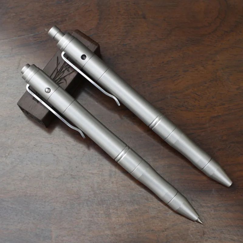 

Handmade 304# Stainless Steel Solid Portable Pressing Signature Pen Tactical Pen EDC Clip Gel Pen As Creative Gift Set