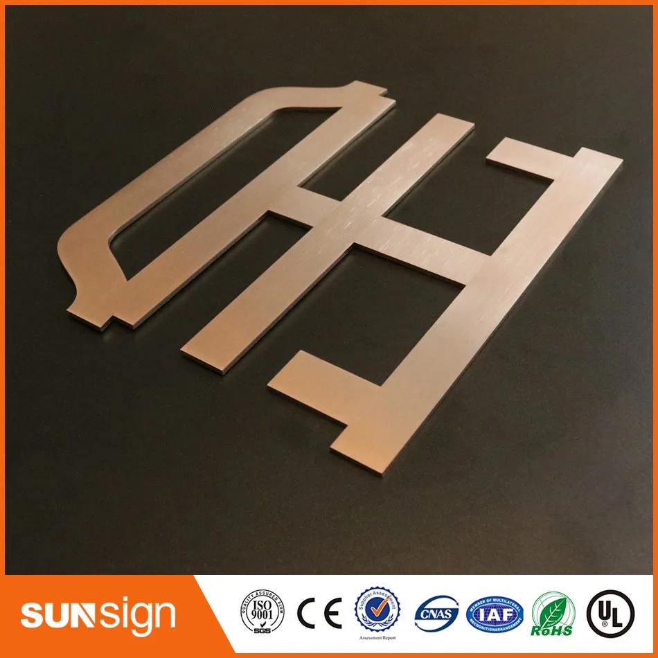 Рисунок 5 - Розовые золотые металлические знаки