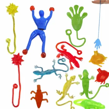 

10pcs/1lot piece 9cm*3cm Silica gel robot Climbing Spider-Man sticky Spiderma Superman Climbing on glass for kids fuuny toy boy